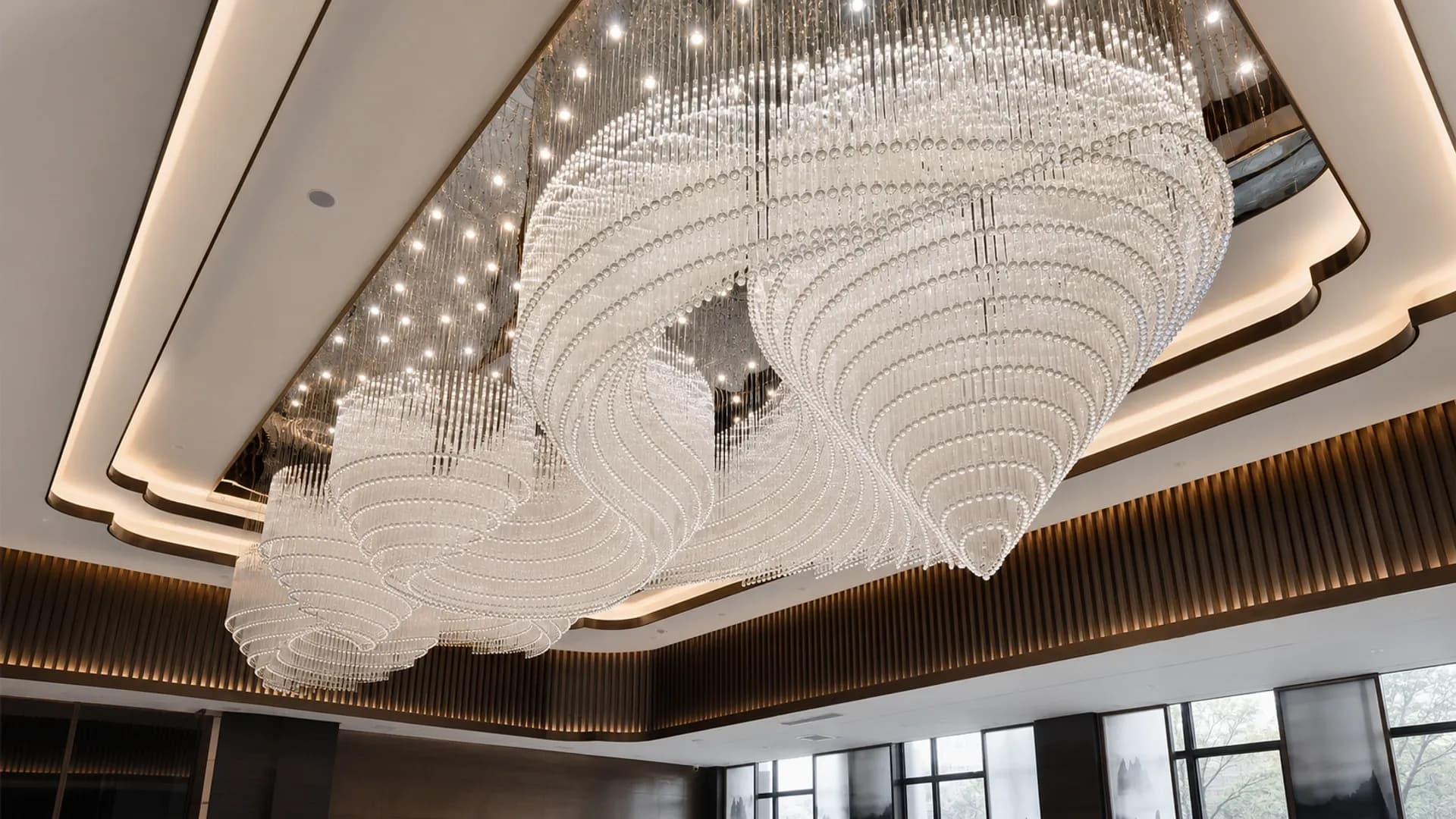 Sculptural crystal lighting installation developed for a large architectural interior